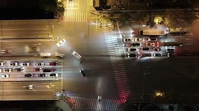 实拍航拍城市夜景十字路口车流延时环绕视频的预览图